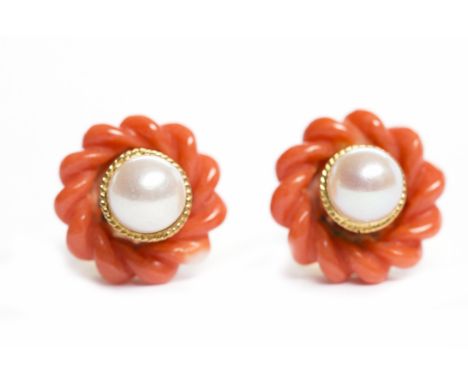 PAIR OF PEARL AND CORAL EARRINGSeach set with a central white spherical pearl 5.9mm diameter surrounded by a carved ropetwist