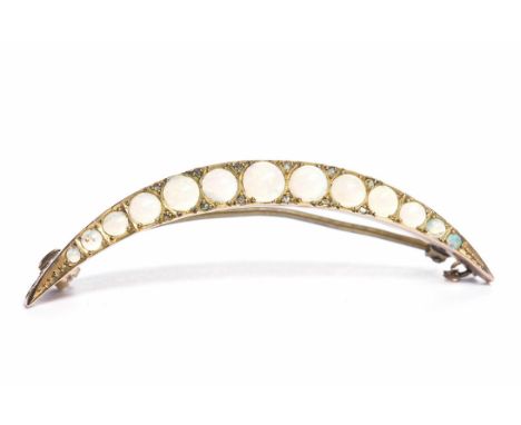 EDWARDIAN OPAL AND DIAMOND CRESCENT BROOCHset with thirteen graduated cabochon cut opals, hallmarked for nine carat gold, 5cm