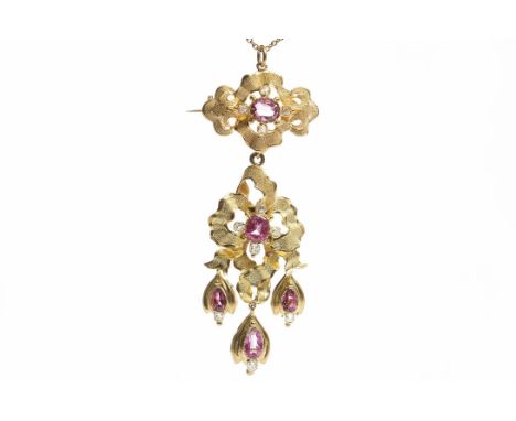 ORNATE VICTORIAN RUBY AND DIAMOND SET PENDANT BROOCHof garland form, openwork and set with oval rubies and old cushion cut di