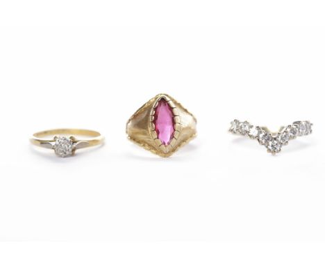 GEM SET WISHBONE RINGin nine carat gold, size O; along with a paste set ring marked 750 and an eighteen carat gold diamond so