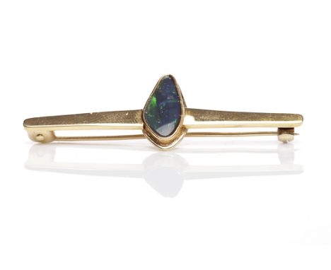 HIGH CARAT GOLD OPAL BROOCHset centrally with a cabochon opal section, unmarked, tests as high carat gold, 6.1g