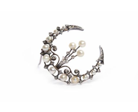 FINE EARLY TWENTIETH CENTURY PEARL AND DIAMOND BROOCHcrescent shaped, openwork and set with spherical white pearls and diamon