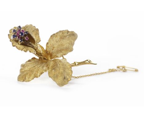 SAPPHIRE AND RUBY SET GOLD FLORAL BROOCHin eighteen carat gold, 19.2g, 58mm long, in a fitted case, retailed by R.L. Christie