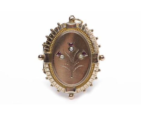 VICTORIAN PEARL AND RUBY SET LOCKETof oval form, with a split pearl and ruby set thistle motif, the outer edge of of the lock