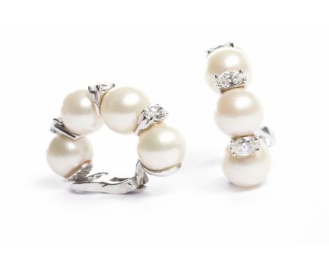PAIR OF PEARL AND DIAMOND SET HALF HOOP EARRINGSeach formed by four spherical white pearls interspaced by three marquise cut 