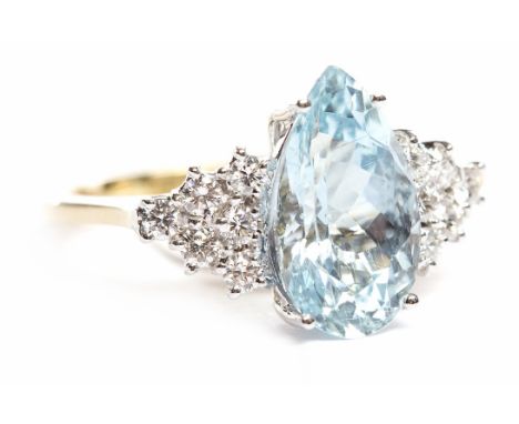 AQUAMARINE AND DIAMOND RINGthe central pear shaped aquamarine of approximately 3.43 carats flanked by round diamonds totallin