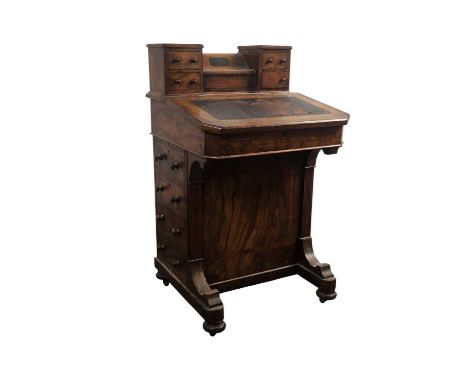 VICTORIAN WALNUT DAVENPORT WRITING DESK, with bun feet and castors84cm high