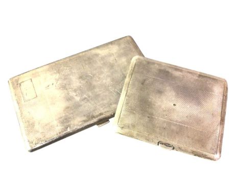 TWO SILVER CIGARETTE CASES, each of rectagular form, with engine turned decoration and initialled, one depicting a map of Ind