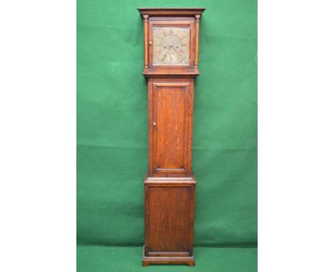 Sam ?uarman, 8 day oak long case clock having brass dial with Roman Numerals and pierced black hands, the movement by Walker 