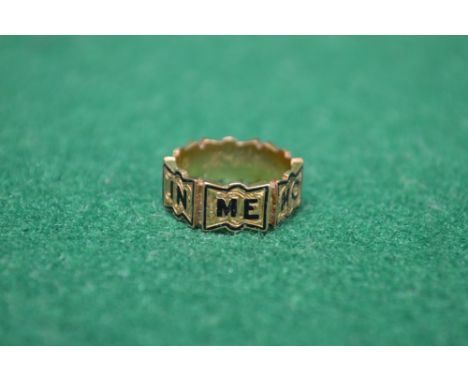 18ct gold mourning ring having engraved decorated panels forming the band with black enamel lettering reading In Memory Of an