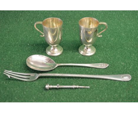 Quantity of silver items to comprise: pair of tot cups, marked for London 1904, long handled pickle fork, marked for Sheffiel