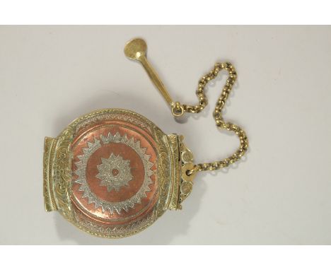 A FINE AND LARGE 18TH CENTURY SRI LANKAN SILVER AND BRASS MOUNTED COPPER LIME PASTE CONTAINER, 11cm top to bottom.
