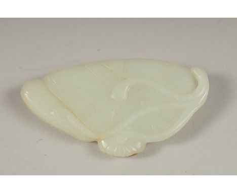 A GOOD CHINESE CARVED JADE LILY PAD, 7.5cm long, 4cm wide.
