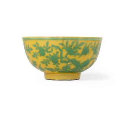 YELLOW-GROUND GREEN-ENAMELLED 'PEACH TREES' BOWL QING DYNASTY, QIANLONG MARK, 18TH-19TH CENTURY 清 乾隆款 黃地綠彩桃樹紋碗 thinly potted 