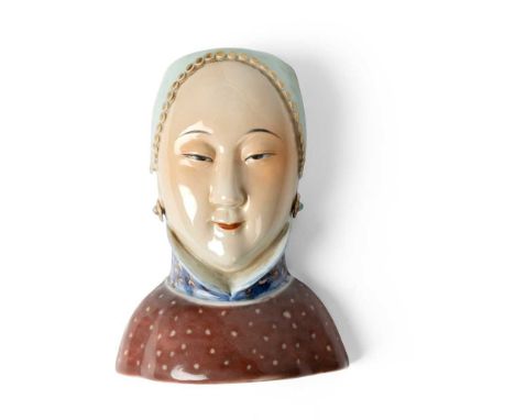 FAMILLE ROSE 'LADY' WALL VASE QING DYNASTY, 18TH-19TH CENTURY 清 粉彩仕女肖像型壁瓶 in the form of a lady's portrait, wearing a high-co