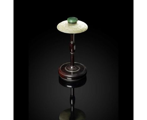 PALE CELADON JADE AND HARDWOOD HAT STAND  QING DYNASTY, 19TH CENTURY  清 硬木嵌青白玉雕五爪龍紋帽架 the domed jade hat rest carved in high 
