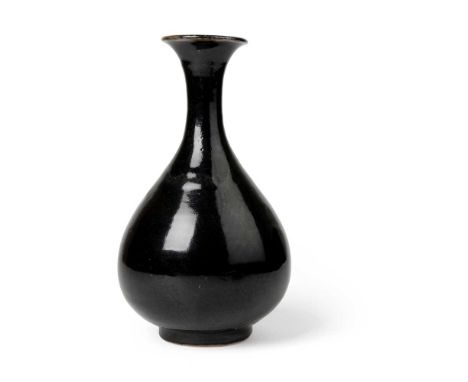 NORTHERN BLACK-GLAZED YUHUCHUN VASE JIN DYNASTY  金 北方窯系黑釉玉壺春瓶 the elegant pear-shaped body resting on a short straight foot r