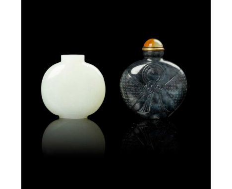 TWO JADE SNUFF BOTTLES QING DYNASTY, 19TH CENTURY  清 白玉素面 及 黑白玉雕包袱紋鼻煙壺（共兩件） one white jade snuff bottle of flattened oval for