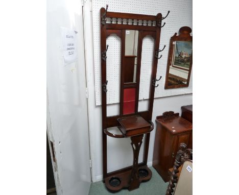 Edwardian Mahogany hall stand with mirror and tile back above single glove box and painted tin umbrella wells 