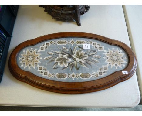 19thC Walnut framed beaded sampler on brass and ceramic casters 