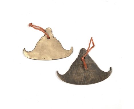 Two Kyi Zi (bell plates) Ceylonese or Burmeseeach in the form of a stupa, with curving pointed edges, the largest 20cm wide x