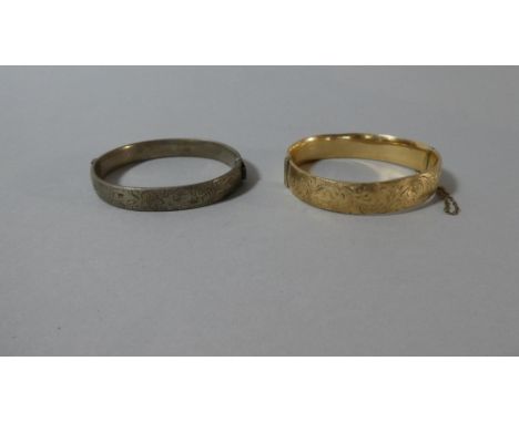 A 9ct Gold Plated Bangle and Silver Bangle 