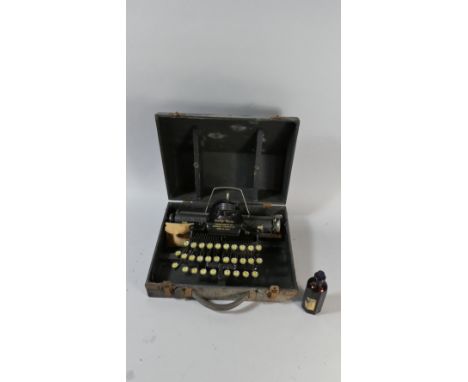 A Vintage American Baby Rem Portable Typewriter in Wooden Case 