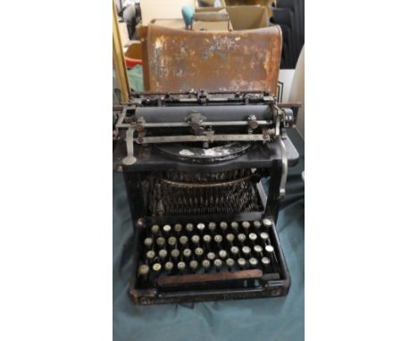 A Vintage Remington Typewriter in Metal Case 