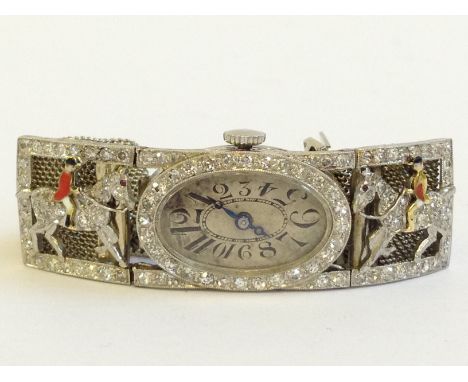 A ladies' Art Deco platinum and diamond encrusted Cartier style cocktail watch with oval face with painted Arabic numerals, d