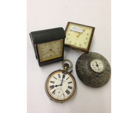 A Swiza folding travel alarm clock together with a jumbo silver plate cased pocket watch, clock face and thermometer in marbl