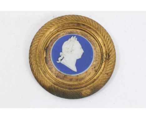 Wedgwood jasparware plaque, relief portrait of George III, in classical style, 5cm diameter, within ormolu frame with rope tw