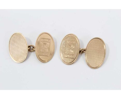 Pair Gentleman's 9ct gold Rolls-Royce oval cufflinks with engraved logos and engine turned decoration.Condition report: Weigh