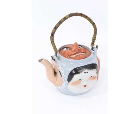 Japanese Banko ware five faces teapot with cane work handle, impressed mark to base, 13.5cm height not including handleCondit
