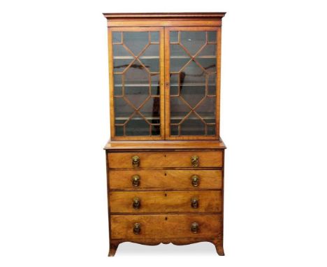 Good George III mahogany and patera inlaid bookcase cabinet, of small size, the upper section with adjustable shelves enclose