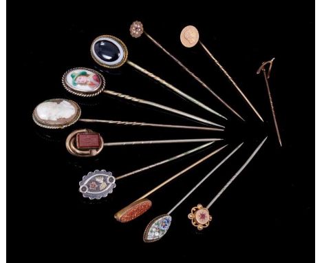 Group of eleven antique stick pins to include Victorian carved shell cameo stick pinProvenance: Estate of the Late Jane Sumne