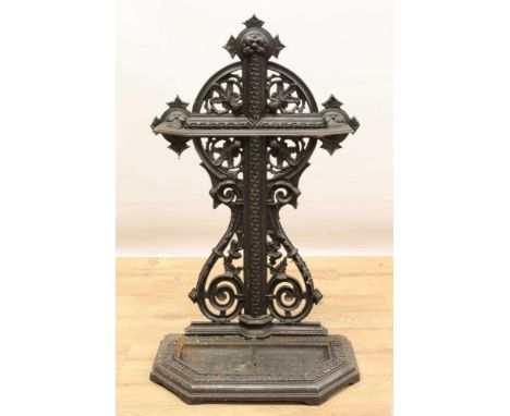 Victorian cast iron stick stand, cruciform and pierced scrolling back plate and removable drip tray with Greek key ornament 