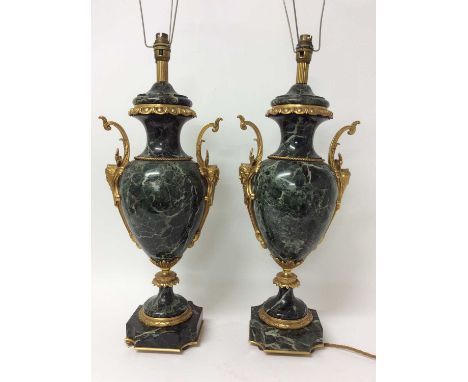 Pair of 18th century style gilt metal mounted verde antico marble table lamps, each of urn form with twin scrolling handles a