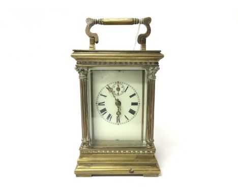 Large late 19th century carriage clock with enamel dial in brass case with Corinthian columns 20.5 cmCondition report: Not ru