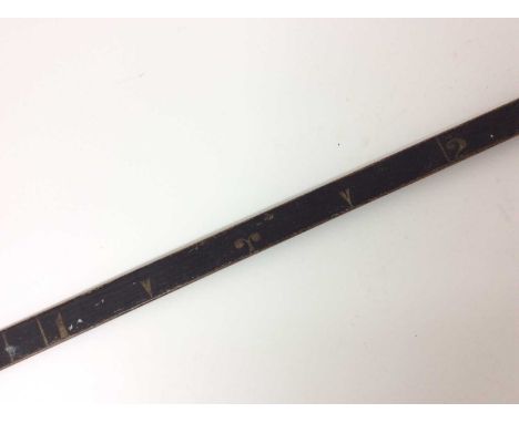 Rare 19th century painted measuring stick, marked to each face for feet and inches on black, five feet in lengthCondition rep