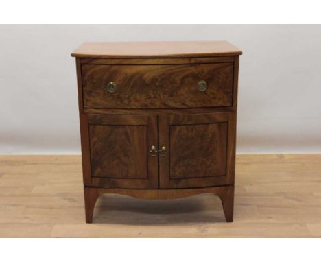 Regency bowfront bedside cupboard, with deep drawer and cupboard below on bracket feet, 63cm wide x 43cm deep x 69cm high 