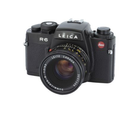 A Leica R6 SLR Camera,1988, black, serial no. 1748116, with Leitz Summicron-R f/2 50mm lens, 1981, black, serial no. 3097205,