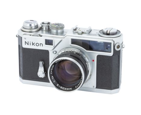 A Nikon SP Rangefinder Camera, 1959, titanium shutter, chrome, serial no. 6215592, with Nikon Nikkor-S f/1.4 50mm lens, black