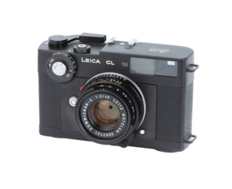 A Leica CL Rangefinder Camera,1974/75, black, serial no. 1305600, with Leitz Summicron-C f/2 40mm lens, black, serial no. 256