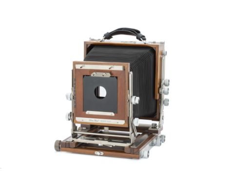 A Shen Hao HZX57-IIA 5x7" Large Format Field Camera,mahogany, serial no. 051556, body, E, complete with 5x7" sprung back, 5x4