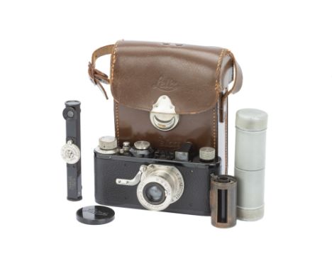 A Leica Ia Close Focus Camera Outfit,1930, black, serial no. 44674, with Leitz Elmar f/3.5 50mm lens, body, G-VG, shutter wor