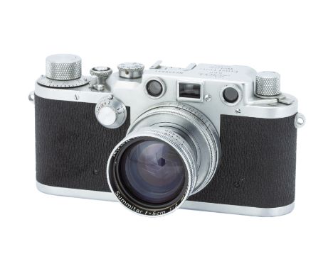 A Leica IIIc 'Sharkskin' Rangefinder Camera,1946/47, chrome, serial no. 438931, with Leitz Summitar f/2 50mm lens, 1950, chro