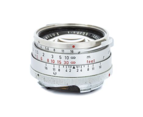 A Leitz Summilux f/1.4 35mm Lens,ver.1 steel rim, 1964, chrome, serial no. 2061156, body, VG, elements, G, one small fungal p