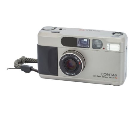 A Contax T2 Compact Camera,1990-, champagne, serial no. 008994, with Carl Zeiss Sonnar T* f/2.8 38mm lens, body, G-VG, powers