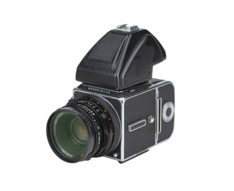 A Hasselblad 501CM Medium Format Camera,2000, chrome, serial no. 10SS23250, with Carl Zeiss Planar CF T* f/2.8 80mm lens, bla