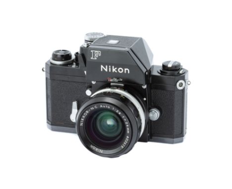 A Nikon FTn SLR Camera,1969, black, serial no. 7027013, with Nikkor-N.C f/2.8 24mm lens, black, serial no. 402619, body, VG, 